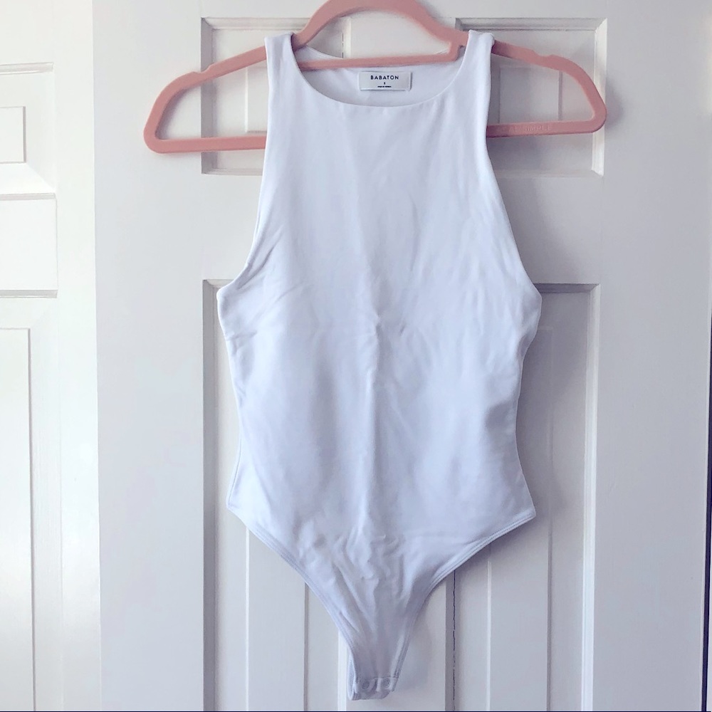 Aritzia Babaton contour 90s bodysuit in white. In good condition.